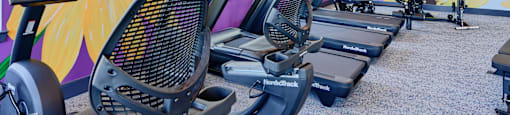 Now leasing senior 1-bedrooms in Baltimore, MD. A gym with treadmills and exercise bikes.