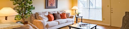 a living room with a couch and a coffee table