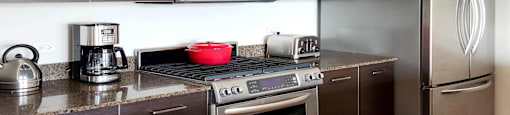 kitchen with stainless appliances and granite countertops
