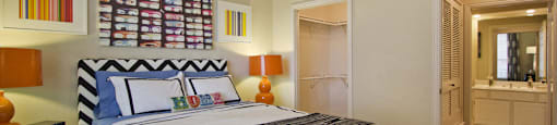 Spacious bedroom with walk-in closet and bathroom at The Biltmore Apartments in Omaha, Nebraska