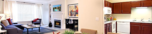Luxury apartments with spacious layout, spacious floor plan, woodburning fireplace, oversized windows, and u-shaped kitchen at The Biltmore Apartments in Omaha, Nebraska
