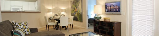 Apartments in southwest Omaha with spacious layout, spacious living room, spacious dining room, and oversized windows at Breckenridge Apartments in southwest Omaha, Nebraska