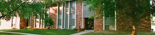 Apartments in La Vista in a park-like setting, scenic views, and lots of trees at The Inverness Apartments