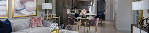 Spacious luxury apartments with porcelain tile floors, dark wood cabinets, and granite countertops at Xenia Apartments in Golden Valley, Minnesota