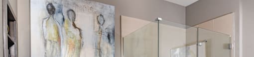 Luxury bathroom with oval soaking tub and glass shower at Xenia Apartments in Golden Valley, Minnesota