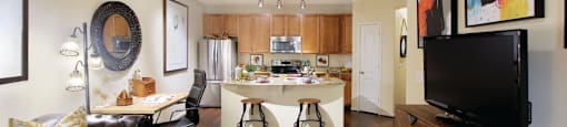 Luxury apartments with spacious open floor plan, hardwood floors, granite countertops, and stainless appliances at The Voss Apartments in Houston.