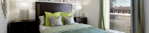 Spacious bedroom with walk-in closet, huge bedroom with oversized windows, attached bathroom at LionsGate Apartments in Lincoln, Nebraska