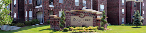 Luxury apartments located next to Rockledge shopping center with red brick exterior and scenic views