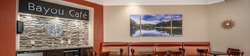 Huge clubhouse with coffee bar, spacious resident lounge, free wi-fi, and fitness center at Woodlake on the Bayou Apartments in Houston.