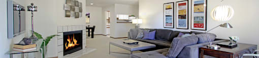 Spacious apartments with woodburning fireplace, huge apartment, spacious living room, and spacious dining room at LionsGate Apartments in Lincoln, Nebraska