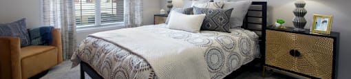 Luxury apartments with spacious bedrooms with attached bathrooms and walk-in closets at Rockledge Oaks Apartments in Lincoln, Nebraska