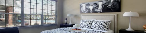 Luxury apartments with master bedroom to fit a king size bed, attached master bathroom and walk-in closet at Bellemeade Apartments in west Des Moines