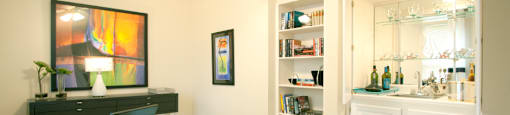 Spacious den or office with wet bar and built-in shelves at The Biltmore Apartments in Omaha, Nebraska