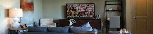 Spacious luxury apartments with colored feature wall and granite countertops at Bellemeade Apartments in west Des Moines