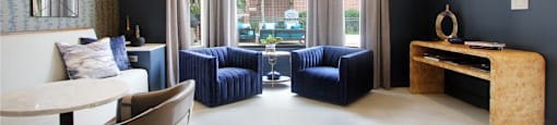 Luxury resident lounge space with free wi-fi at Tuscany Apartments in Houston.