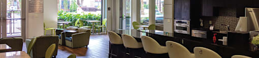 Luxury apartments with coffee bar, cyber café, resident lounge, and resident game room at The Voss Apartments in Houston.