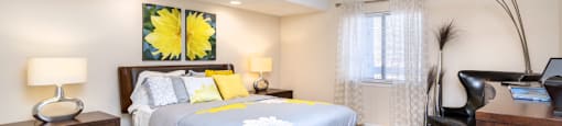 Huge master bedroom with attached walk-in closet and master bathroom, spacious master bedroom at Embassy Park Apartments in Omaha, Nebraska