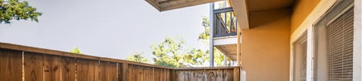 Private fenced in patio at Woodlake Oaks Apartments in Houston