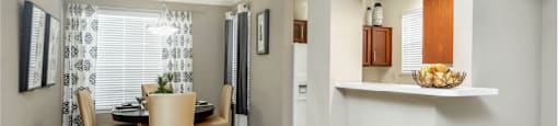 Spacious dining room and kitchen with honey brown toned cabinets with modern silver hardware, and white appliances.