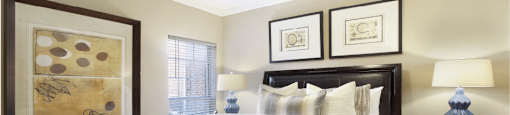 Luxury apartments with spacious bedrooms that can fit a king-size bed with attached bathrooms and walk-in closets at The Dorchester Apartments in north Dallas.