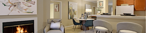 Spacious apartments with oversized windows, wood burning fireplaces, breakfast bar, and built-in shelves at The Dorchester Apartments in north Dallas.