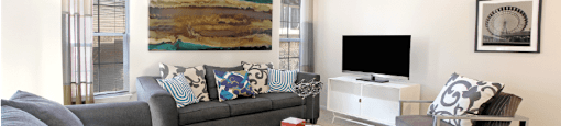 Apartments in southwest Omaha with spacious layout, spacious living room, open floor plan, lots of natural light, and oversized windows, at Breckenridge Apartments