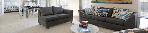 Apartments in southwest Omaha with open floor plan, open layout, spacious apartment, spacious living room, spacious dining room, lots of natural light, and oversized windows at Breckenridge Apartments in Omaha, Nebraska