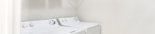 Apartments in southwest Omaha with full-size washer and dryer in unit, separate laundry room in apartment at Breckenridge Apartments in Omaha, Nebraska