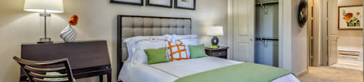 Luxury apartments with master bedroom to fit a king size bed, attached master bathroom and walk-in closet at Villa Piana Apartments in Dallas
