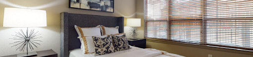 Luxury apartments with master bedroom to fit a king size bed, attached master bathroom and walk-in closet at Bellemeade Apartments in west Des Moines