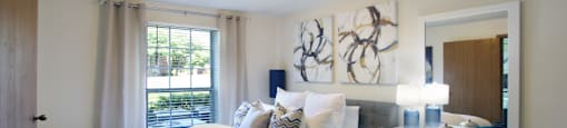 Spacious master bedroom with attached walk-in closet and master bathroom at Tanglewood Apartments in Lincoln, Nebraska