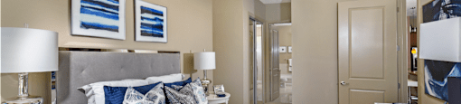 Luxury apartments with master bedroom to fit a king size bed, attached master bathroom and walk-in closet at Luxembourg Apartments in Bloomington Minnesota