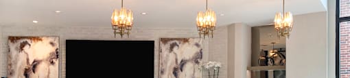 Luxury resident lounge with area for entertaining at Xenia Apartments in Golden Valley, Minnesota