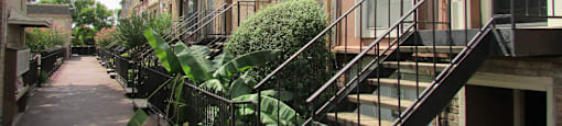 Beautiful unique townhome community near the Galleria within walking distance of shops, restaurants, and entertainment at Briarwood Apartments in Houston.