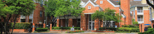 Luxury apartments in north Dallas near the Mary Kay Museum with beautiful landscaping, attached garages, and golf course views.