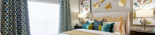 Luxury apartments with spacious bedrooms with attached bathrooms and walk-in closets in north Dallas at Kensington Square Apartments.