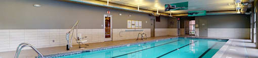 Luxury apartments with indoor exercise pool and multi-level fitness center at Luxembourg Apartments in Bloomington Minnesota