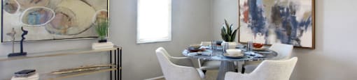 Spacious dining room with gray wall color at Inwood Apartments in La Vista, Nebraska
