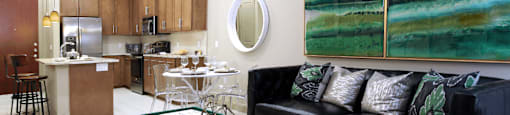 Luxury apartments in Bloomington Minnesota with granite countertops, stainless steel appliances, built-in wine rack, kitchen island, and porcelain tile floor at Luxembourg Apartments