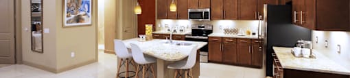 Luxury apartments in Bloomington Minnesota with spacious floor plan, granite countertops, stainless steel appliances, built-in wine rack, kitchen island, and porcelain tile floor at Luxembourg Apartments