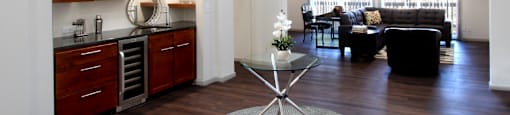 a living room with a table and a couch
