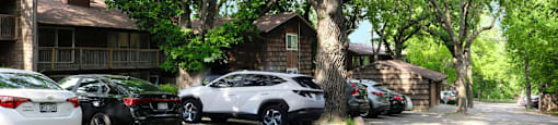 car outdoors tree apartment