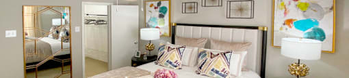 Spacious bedroom that can fit a king size bed with walk-in closet and attached bathroom at Preston Village Apartments in north Dallas