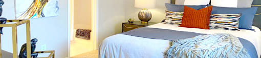 Spacious bedroom that can fit a king size bed with walk-in closet and attached bathroom at Preston Village Apartments in north Dallas