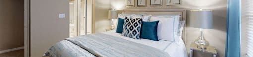 Luxury apartments with spacious bedrooms, walk-in closets, and ceiling fans at Tuscany Gate Apartments in Houston.