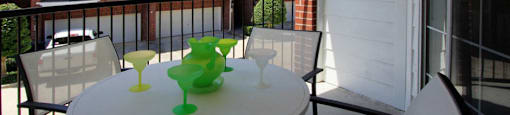 Luxury townhomes in a gated community with red brick exteriors and attached 2-car garages at Tuscany Villas in Houston.