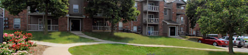 Apartments near the University of Nebraska East Campus with beautiful landscaping, lush landscaping, scenic views, large balconies, spacious balconies, at Tanglewood Apartments