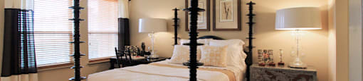 Luxury apartments with master bedroom to fit a king size bed, attached master bathroom and walk-in closet at Villa Piana Apartments in Dallas