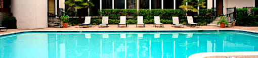 Gated apartments with 4 swimming pools, convenient bayou location and scenic views at Woodlake on the Bayou Apartments in Houston.