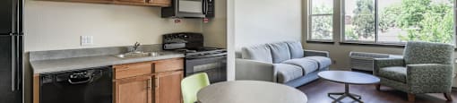 Dining And Kitchen at Arroyo Village Apartments, Denver, Colorado